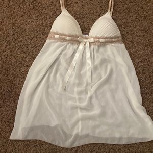 Women’s lingerie with adjustable straps and padded cup area. Size Small